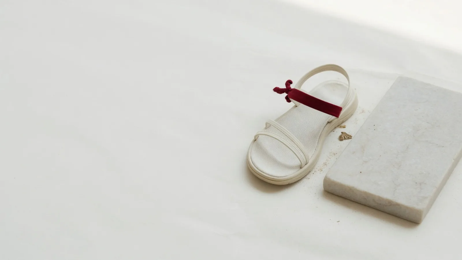 A sandal on a step